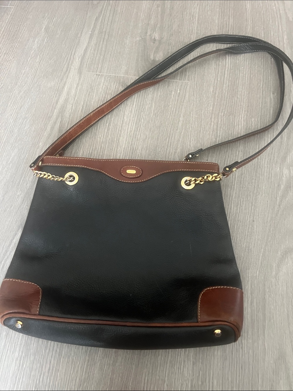 Bally Black and Brown Leather Shoulder Bag with Gold Hardware , worn on